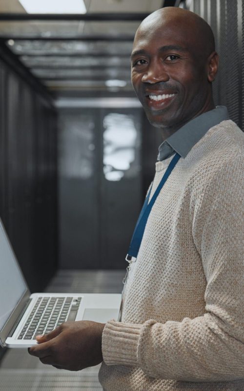 Server room, laptop and man portrait or technician for data center, system and cybersecurity code. .
